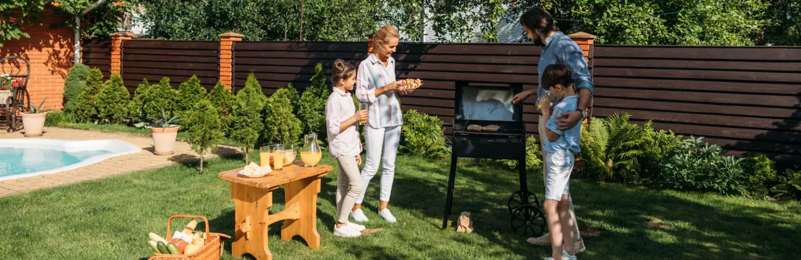 Family cooking outside